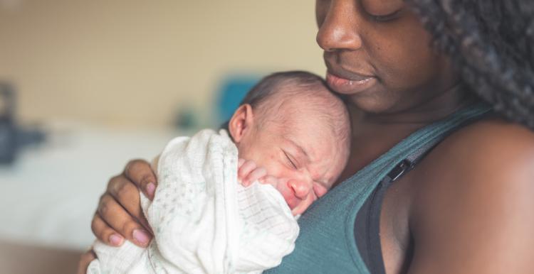 Mother holding a baby